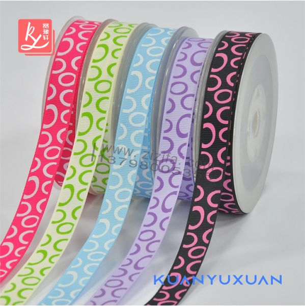 Multiple colors of grosgrain ribbon printed circles